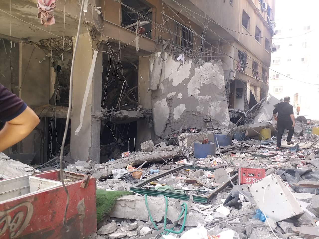 Damage from the damaged Al Jawhara Tower in Gaza City.