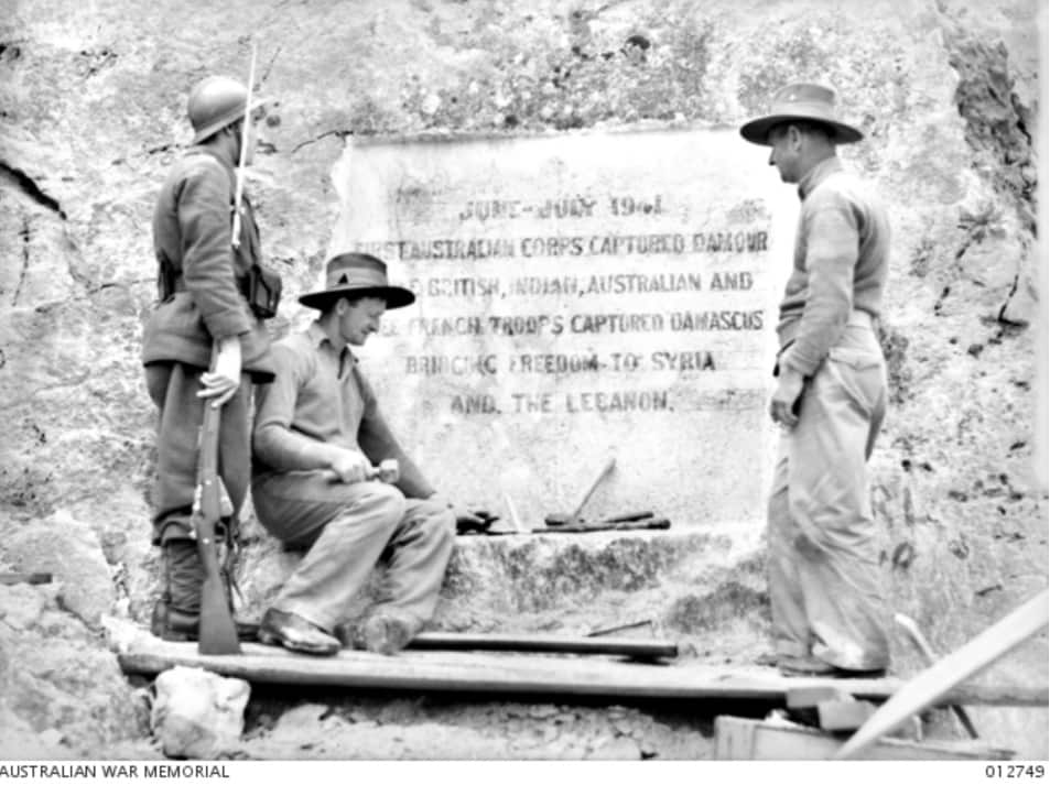 An inscription cut into a cliff to record the capture of Damour by the Australians.