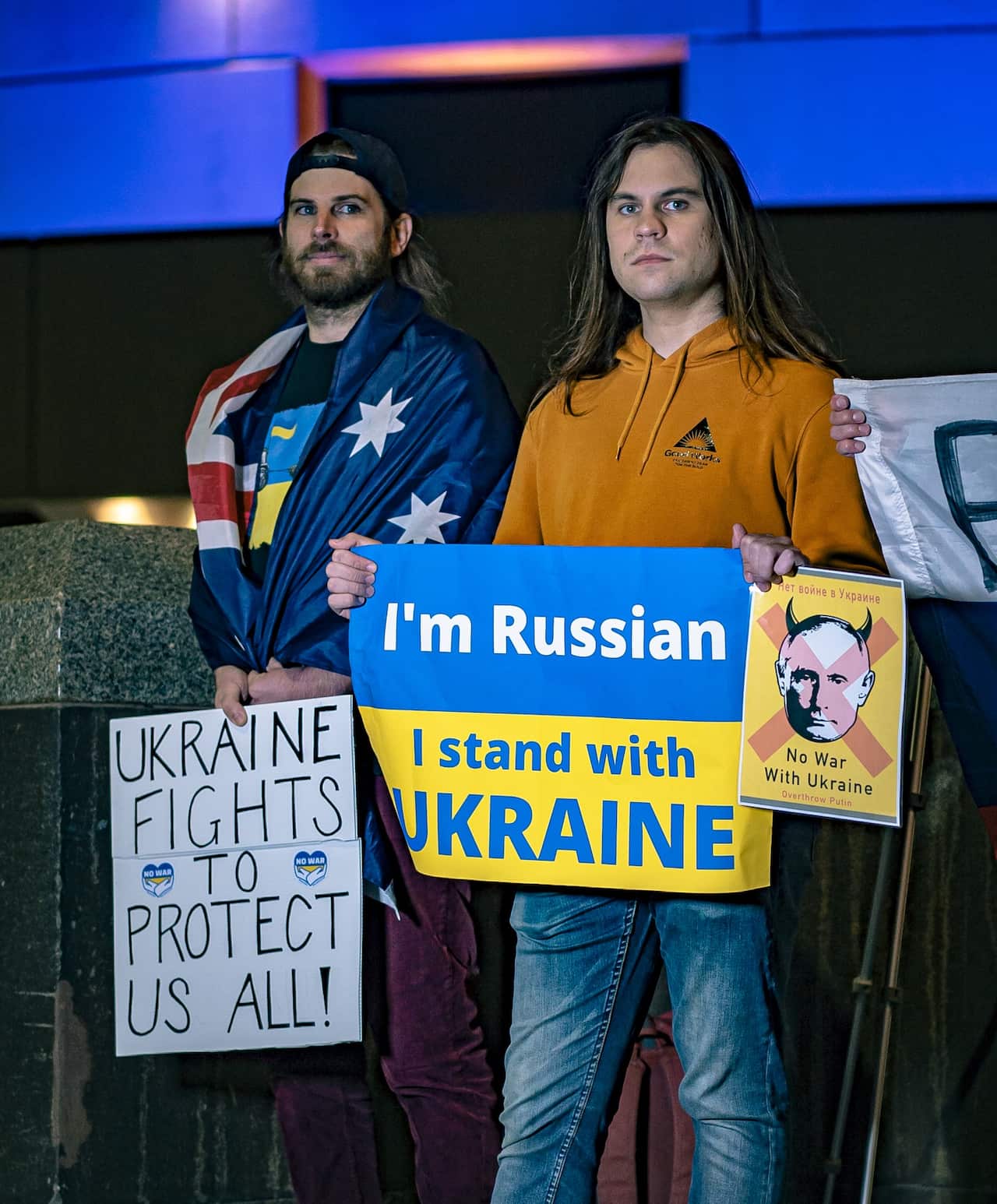 Daniel Mitchell with another activist at Princes Bridge.