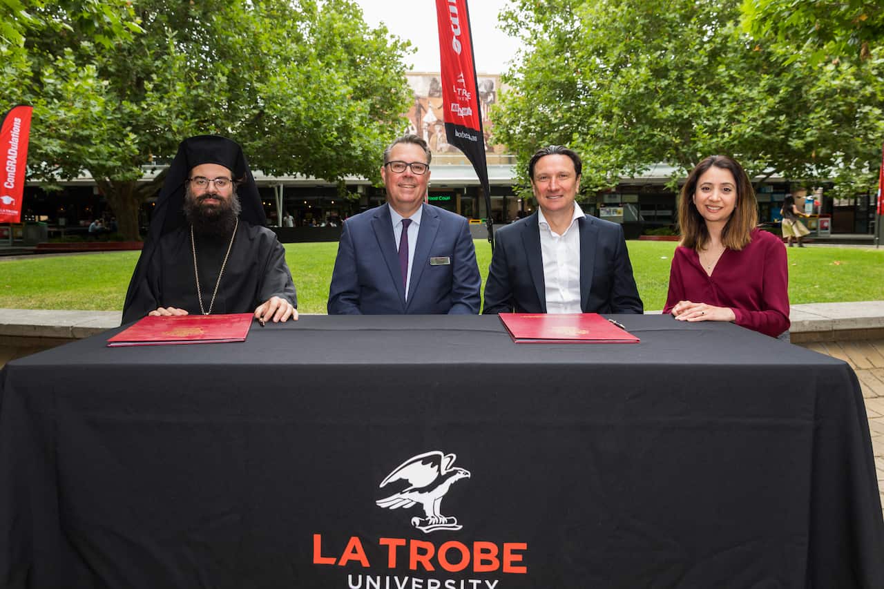 Father Evmenios Vasilopoulos, John Dewar, Bill Papastergiadis, Kat Theophanous. 