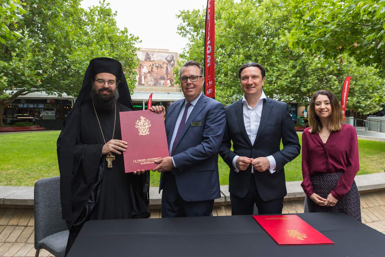 Father Evmenios Vasilopoulos, Bill Papastergiadis, John Dewar. Kat Theophanous. 