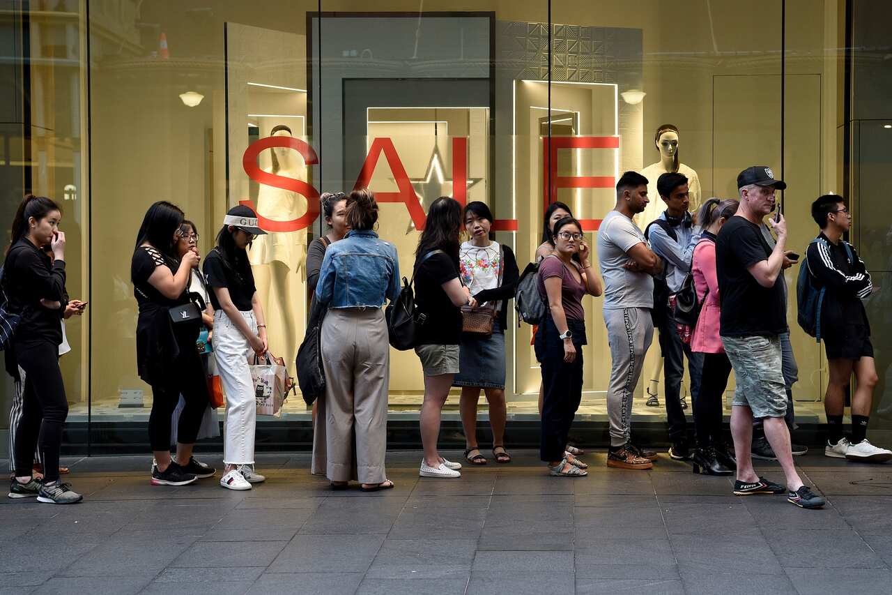 Shoppers line up during Boxing Day sales in Pitt St Mall in Sydney.