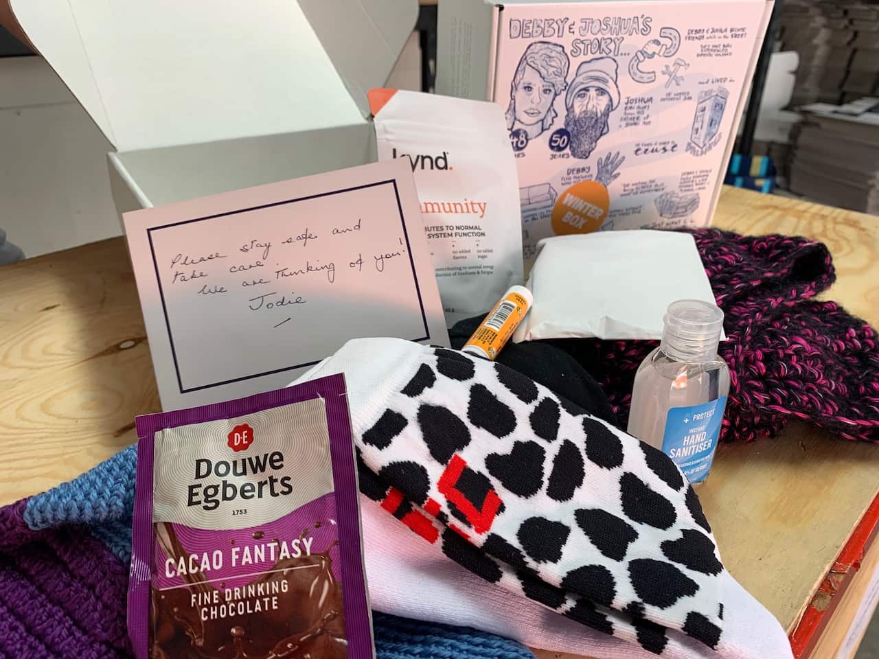 Items like scarves and hot chocolate are included in The Good Boxes.