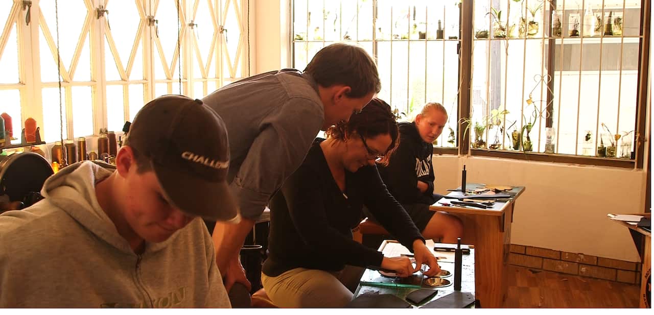 David Kelly oversees a cobbling class.