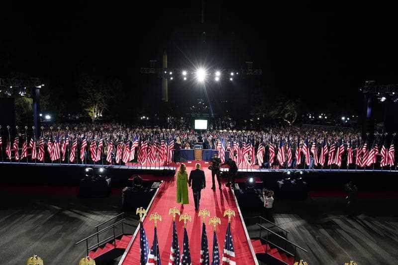 President Donald Trump and first lady Melania Trump arrive on the South Lawn of the White House.