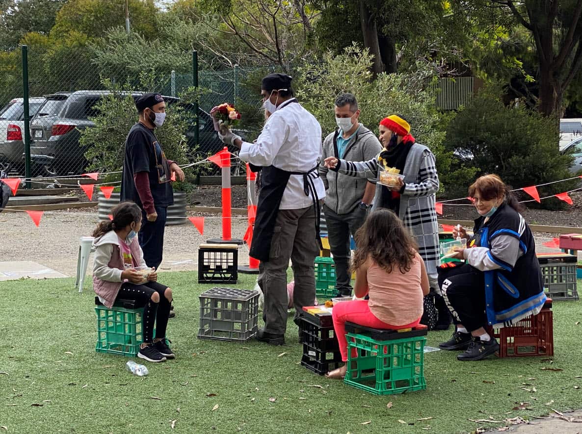 Daman and Diya Shrivastav serving free meals at Perry St, Collingwood