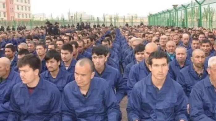 A picture posted on government social media in April 2017 shows detainees in a camp in Hotan Prefecture.