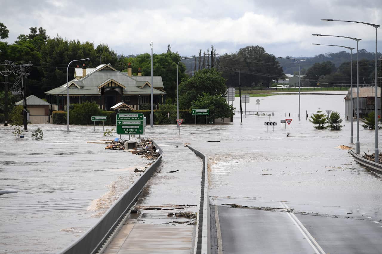 Debris carried by floodwater in the swollen Hawkesbury river. Thursday, March 3, 2022