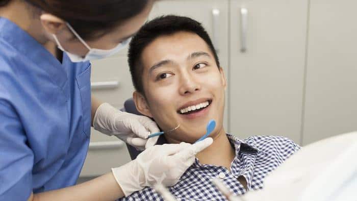 Male Patient Receiving Treatment In Clinic