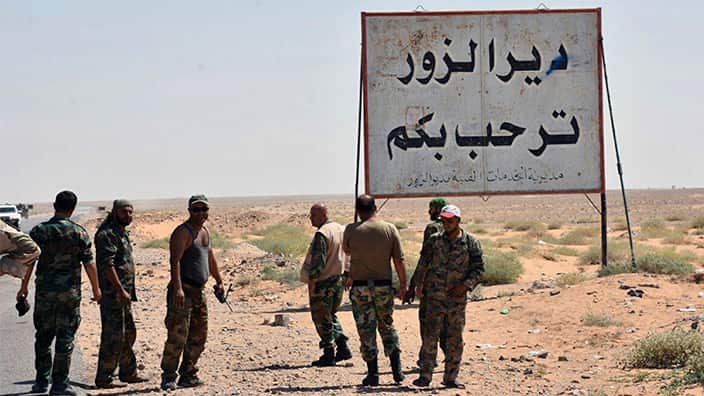 Syrian troops and pro-government gunmen