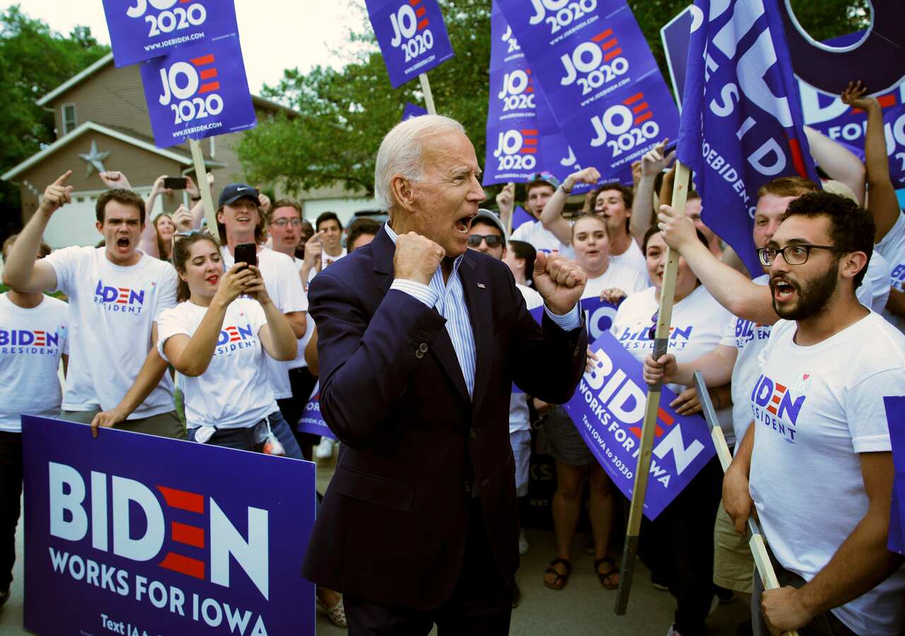 FILE - In this Aug. 9, 2019, file photo, former Vice President and Democratic presidential candidate Joe Biden meets with supporters before speaking at the Iowa Democratic Wing Ding at the Surf Ballroom in Clear Lake, Iowa. (AP Photo/John Locher, File)
