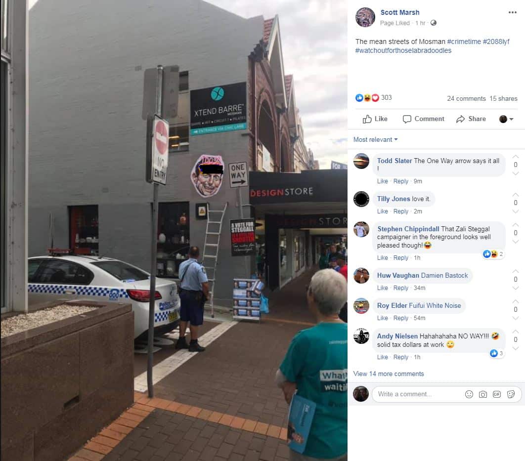 The posters featuring an offensive word on Tony Abbott's face have been removed.