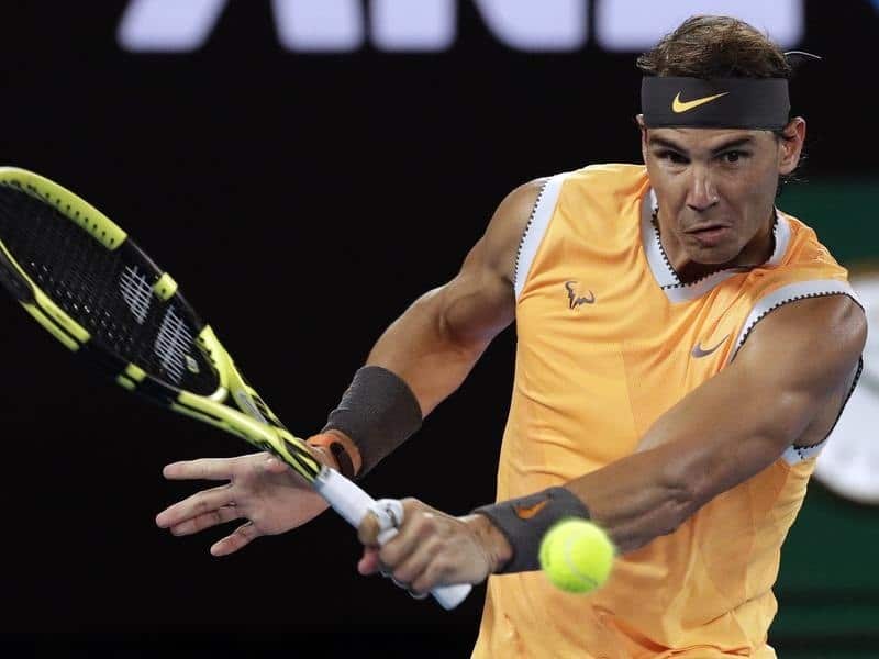 Spain's Rafael Nadal makes a backhand return.