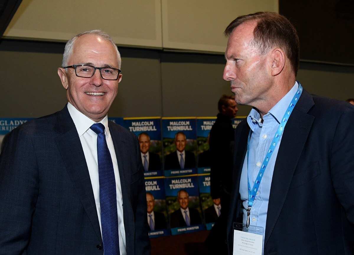 Prime Minister Malcom Turnbull and former prime minister Tony Abbott speak during the NSW Liberal Party Futures convention