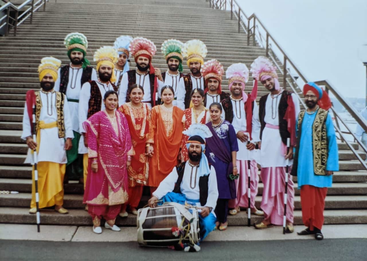 Devinder Dharia (L) and his dance team at cultural festival in Sydney. 