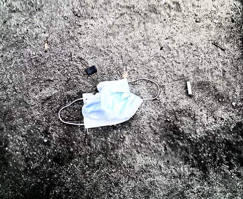 It is common to see surgical masks with other waste in the street.
