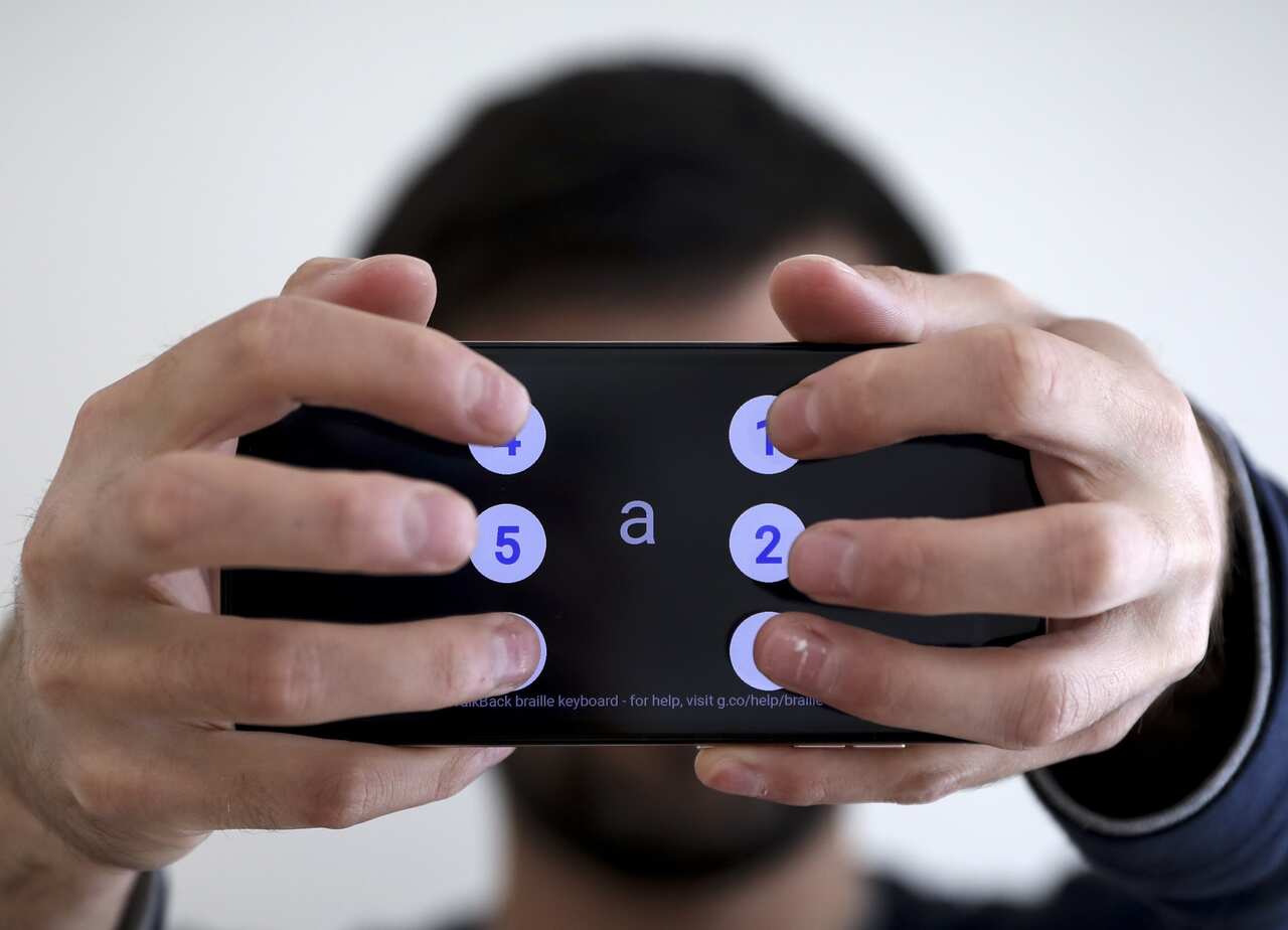 Using a virtual Braille keyboard.