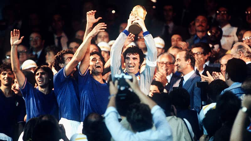 1982 World Cup Final. Madrid, Spain. 11th July, 1982. Italy 3 v West Germany 1. Italian captain Dino Zoff holds aloft the World Cup trophy after receiving from King Juan Carlos of Spain.
