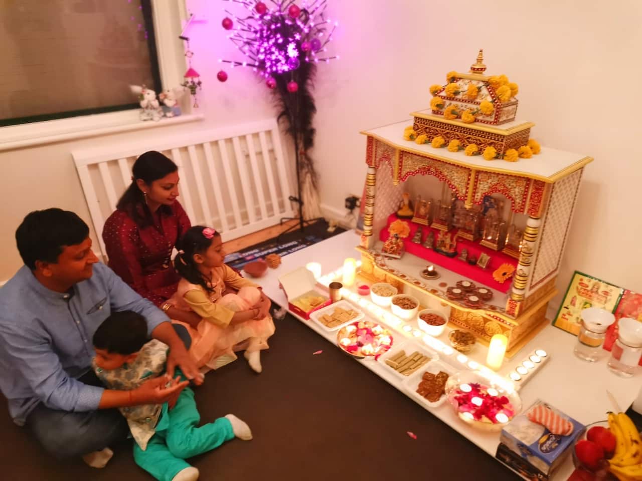 A family in Adelaide celebrating Diwali at home