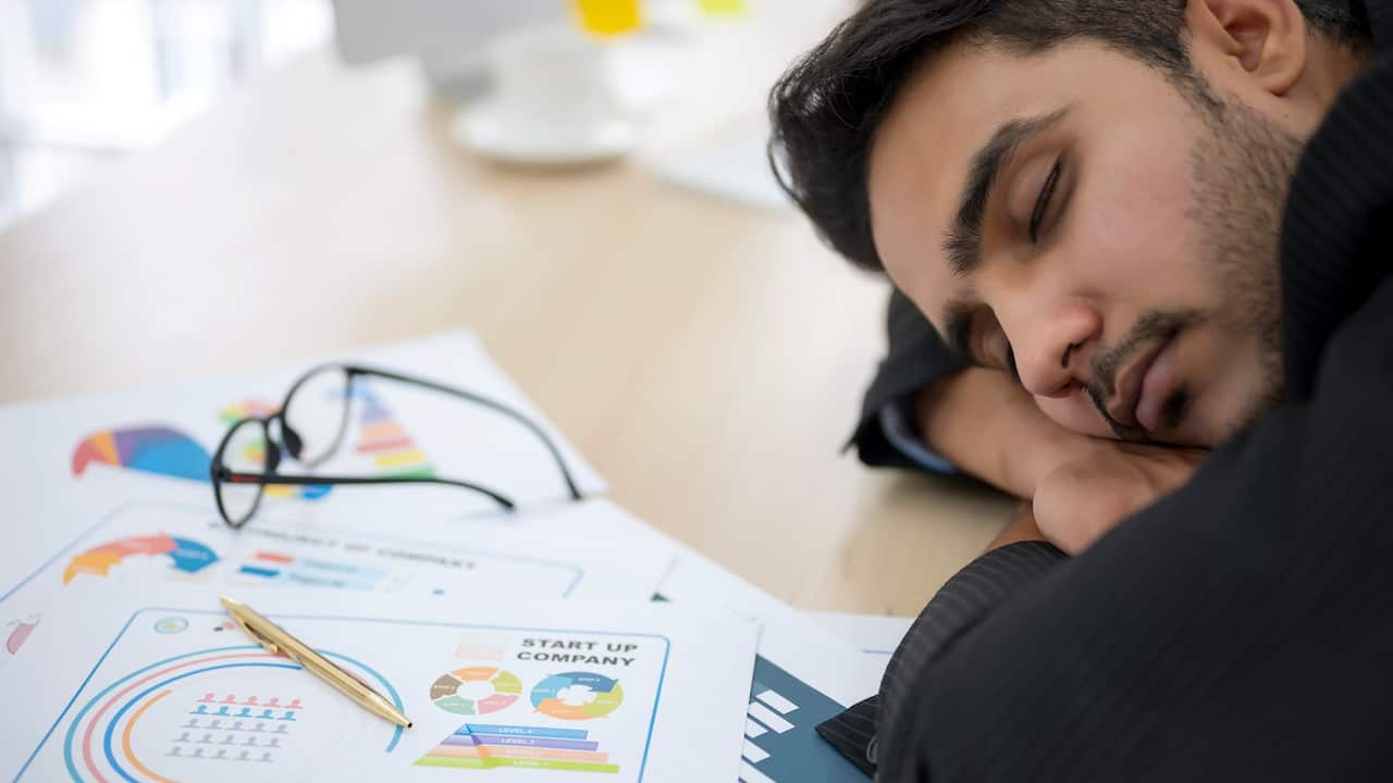 Tired youngster at work