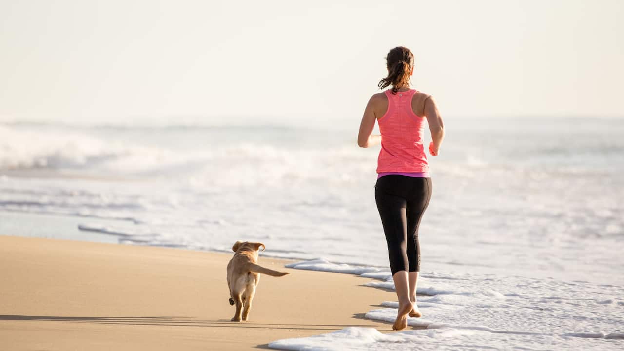 woman running beach