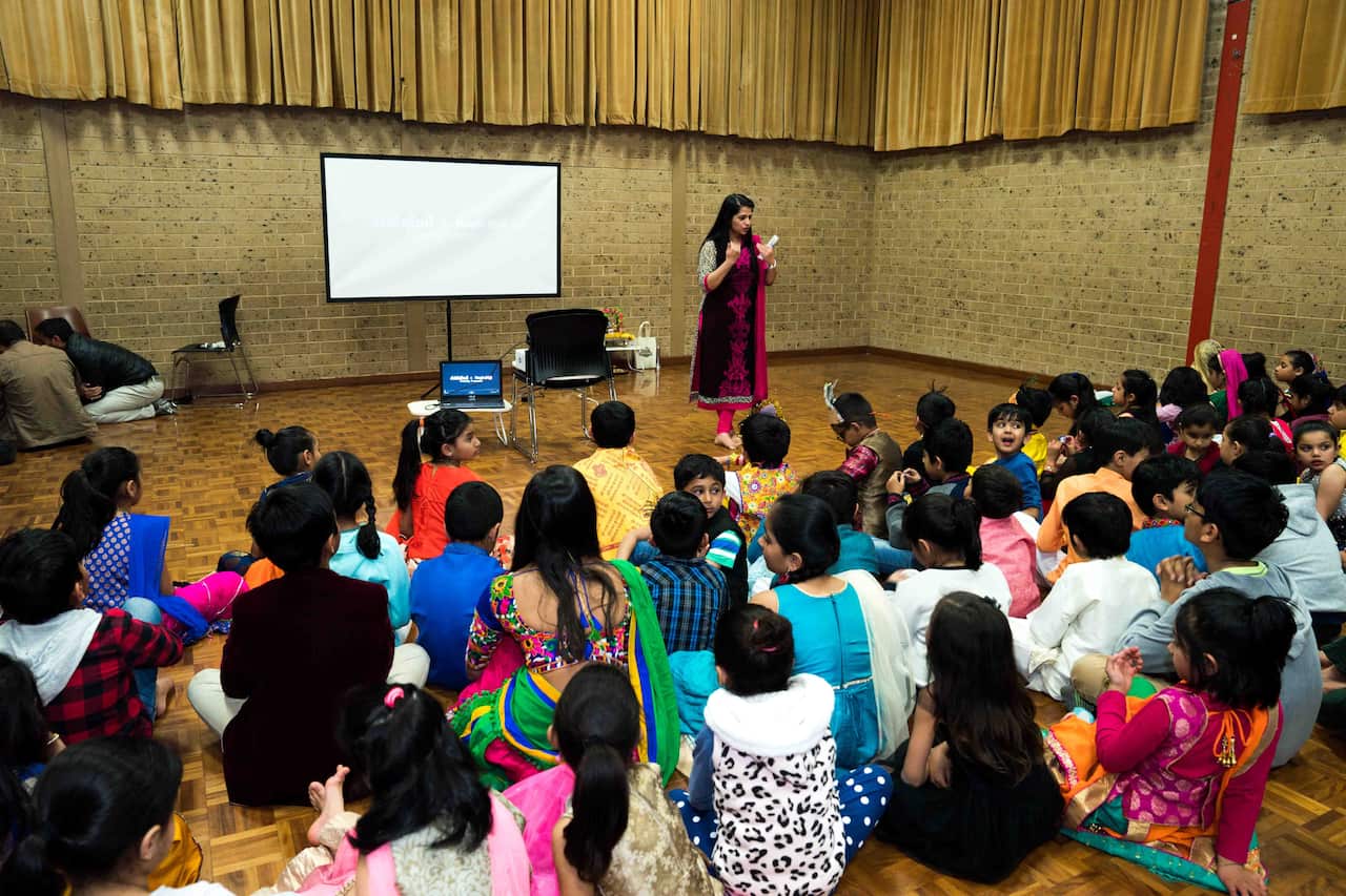 Students learning Gujarati in Adelaide.