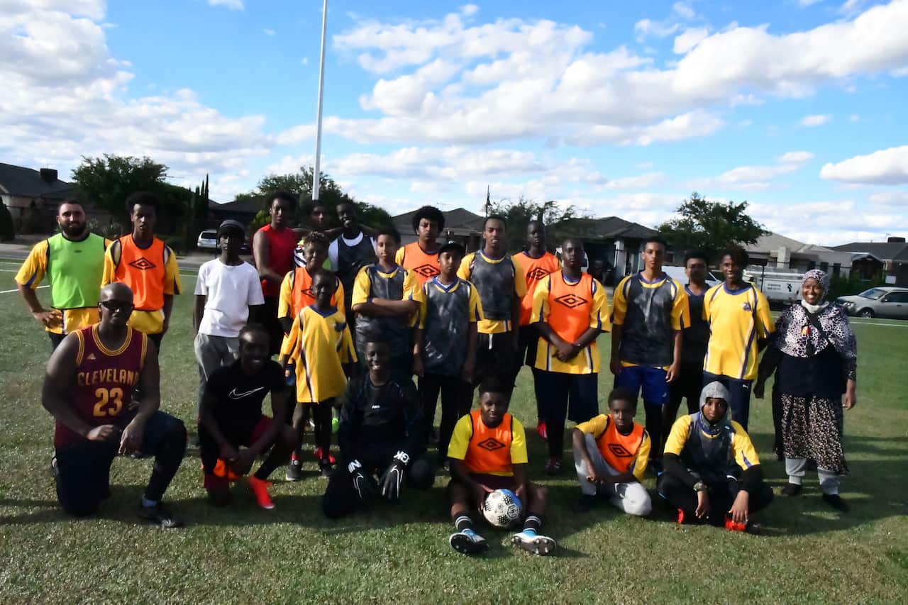 Some of the older players in the field with Fatma Abdi 