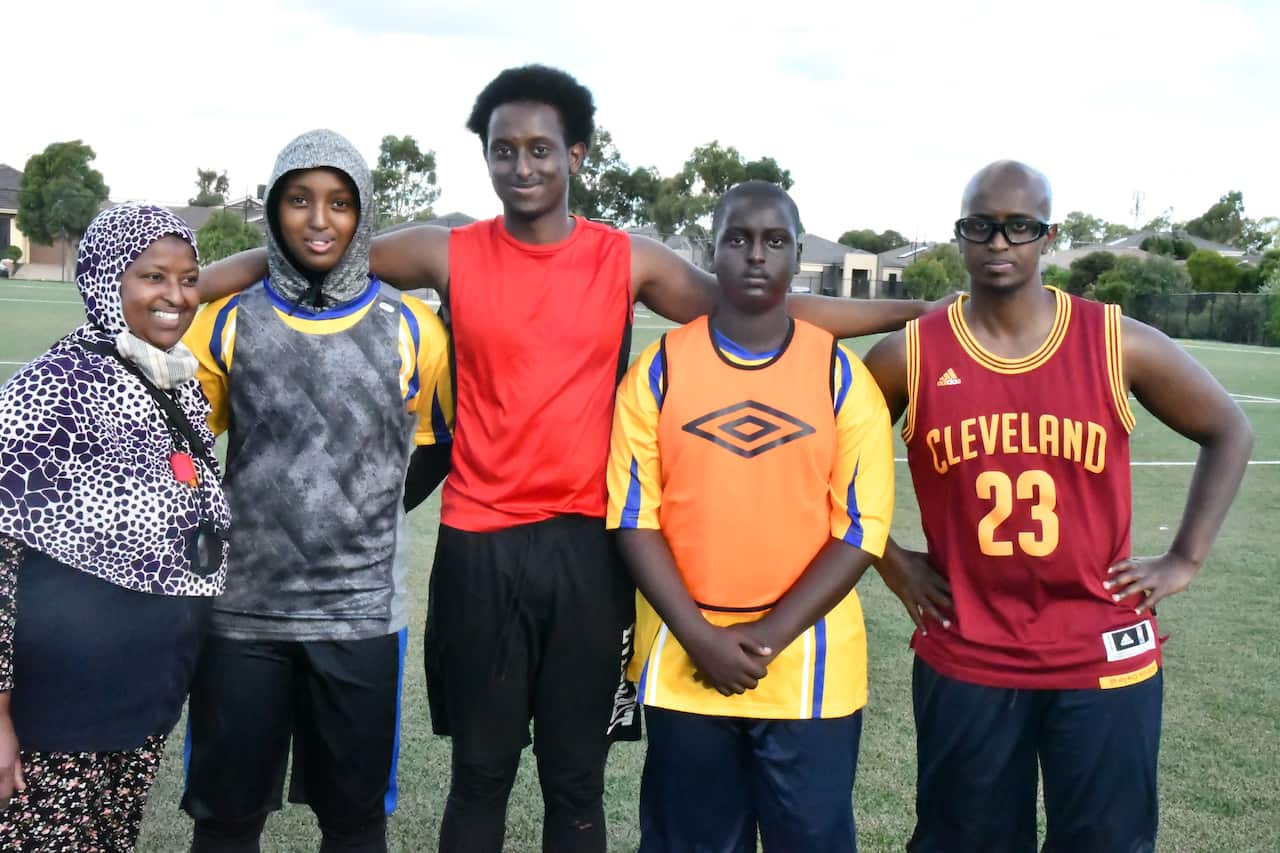 Fatma Abdi and her children during the training session at Tarneit Rise 