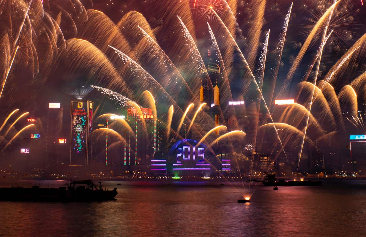 Fireworks light up the sky over Victoria Harbour to celebrate New Year's Day in Hong Kong.