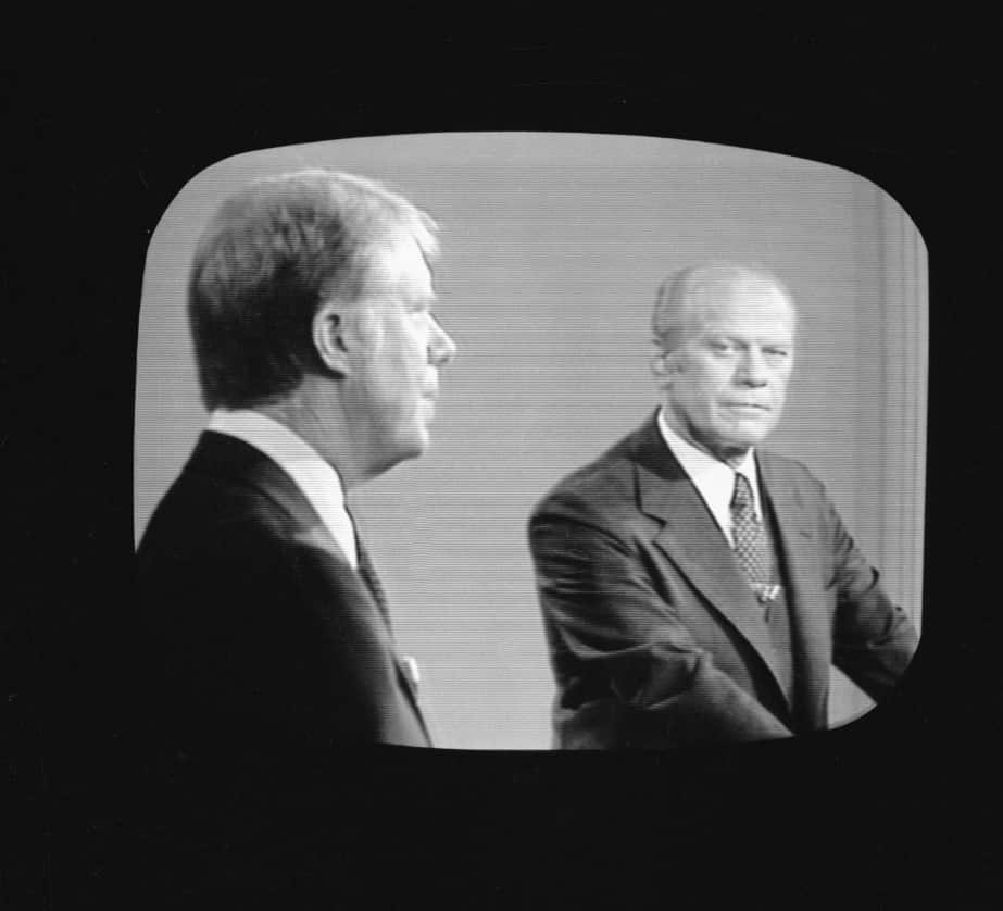 Jimmy Carter (L) and Gerald Ford during debate.