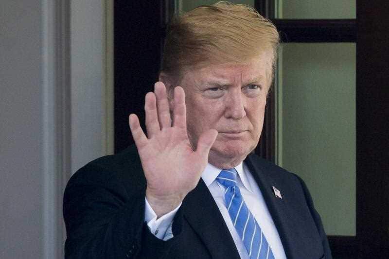 US President Donald J. Trump waves after seeing off Prime Minister of the Netherlands Mark Rutte (not pictured) at the outside the West Wing.