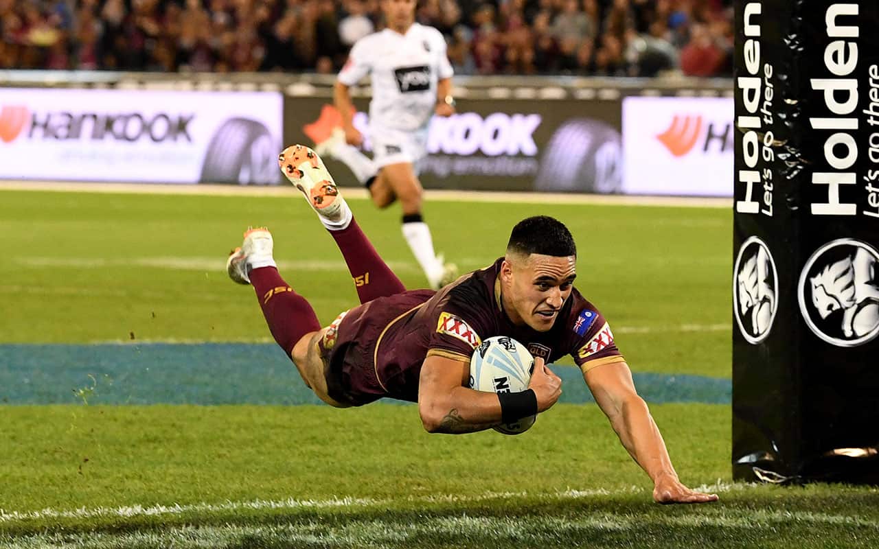 Valentine Holmes of the Maroons scores a try during Game 1 of the 2018 State of Origin series at the MCG.