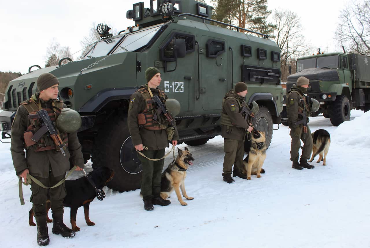 Servicemen of the National Guard of Ukraine take part in tactical and special exercises within the command-staff exercises in a village near northern Ukraine. 
