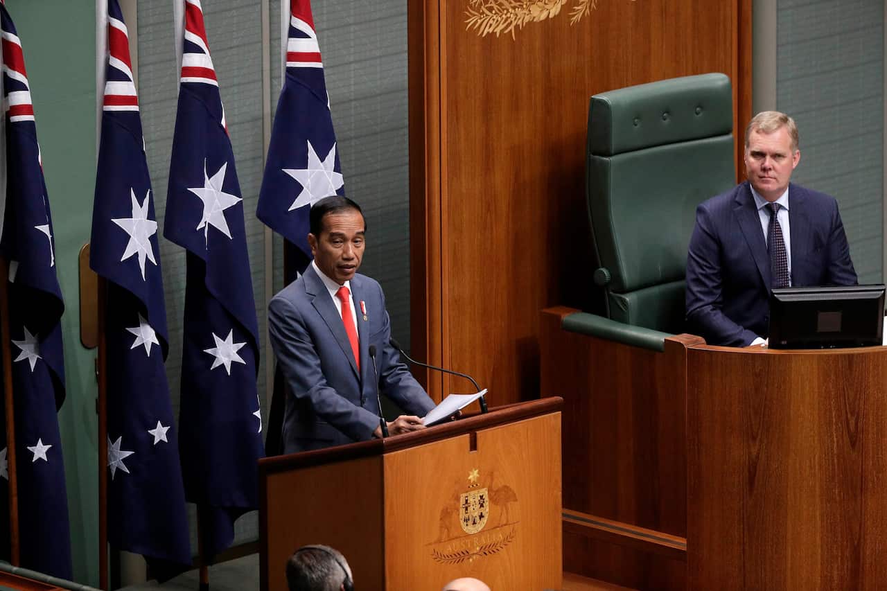 Indonesia President Joko Widodo, left, addresses the Parliament in Canberra.