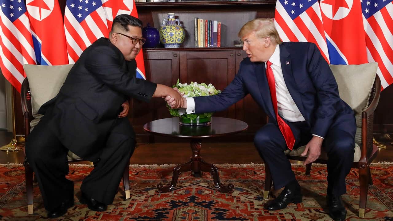 North Korea leader Kim Jong Un and US President Donald Trump shake hands during their first meeting in Singapore in June 2018. 