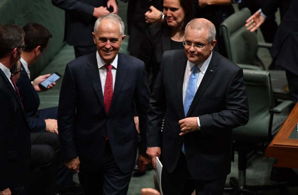 Prime Minister Malcolm Turnbull and Treasurer Scott Morrison leave after delivering the 2018 Budget in the House of Representatives.