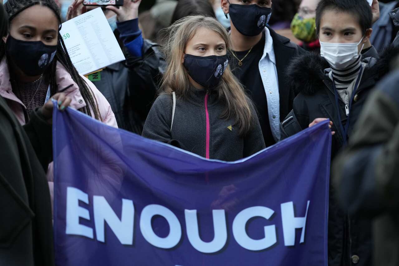 Climate change activist Greta Thunberg takes part in Fridays For Future protest near the COP26 venue.