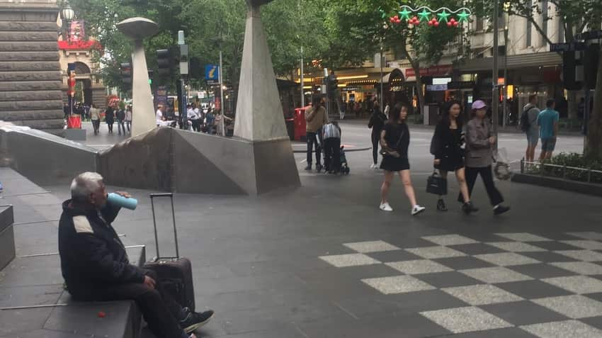 A man being alone in the city in Melbourne, Dec 2019.