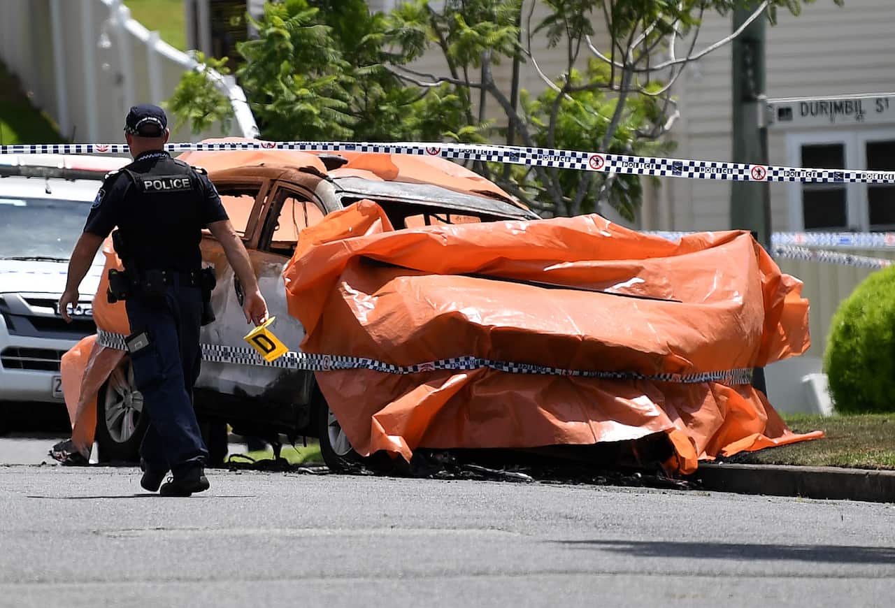 Police attend the scene of a car fire which claimed the lives of multiple people, including children in Brisbane, Wednesday, February 19, 2020. (AAP Image/Dan Peled) NO ARCHIVING