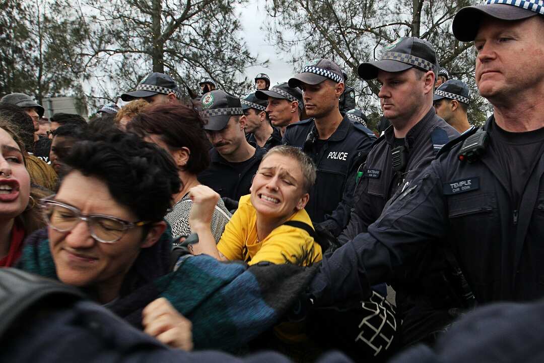 Supporters of British alt-right commentator Milo Yiannopoulos clash with left-wing protesters in Lilyfield, Sydney, on Tuesday, December 5, 2017.