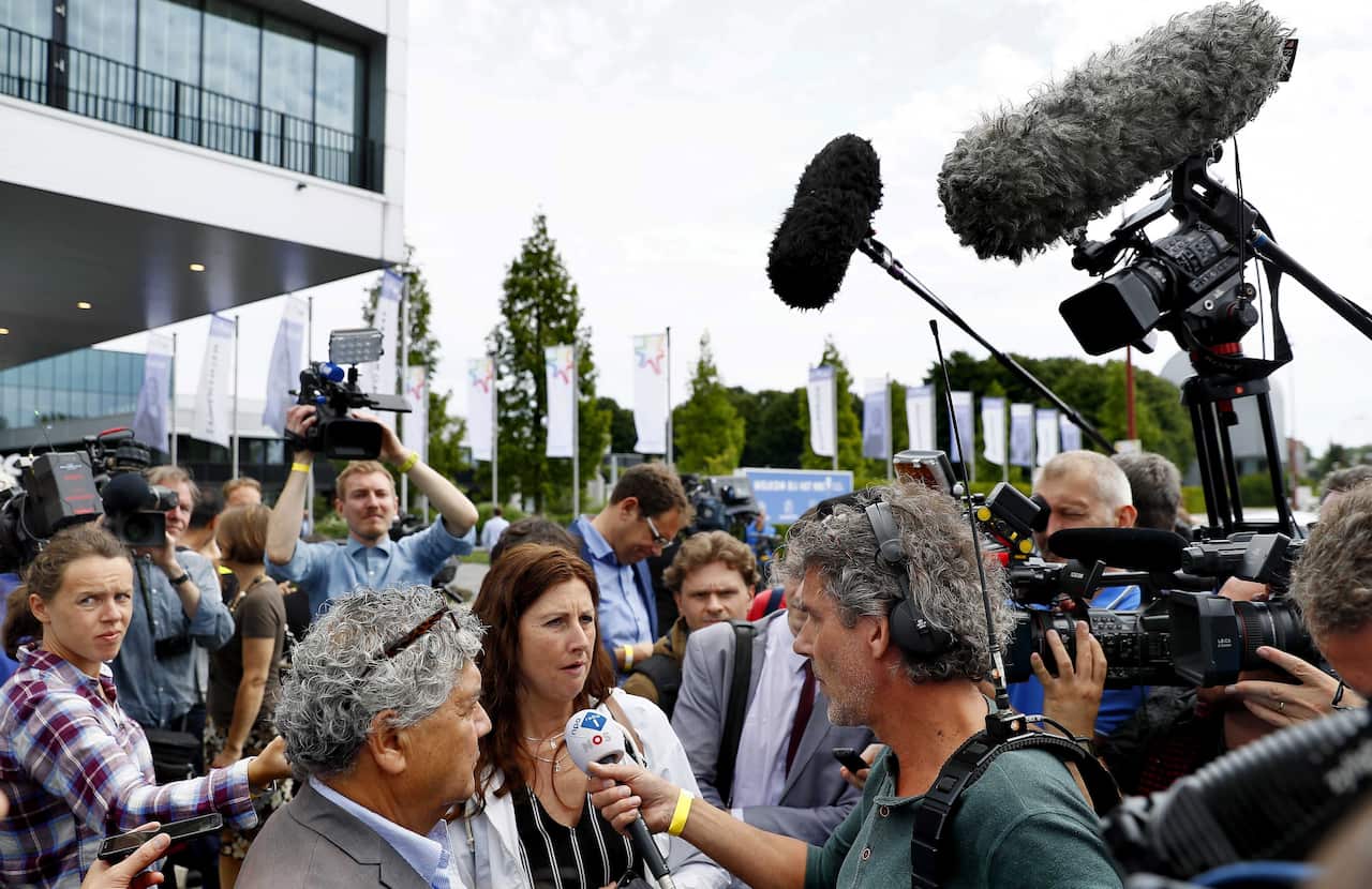 Surviving relatives speak to the press at the press conference of the Joint Investigation Team (JIT).