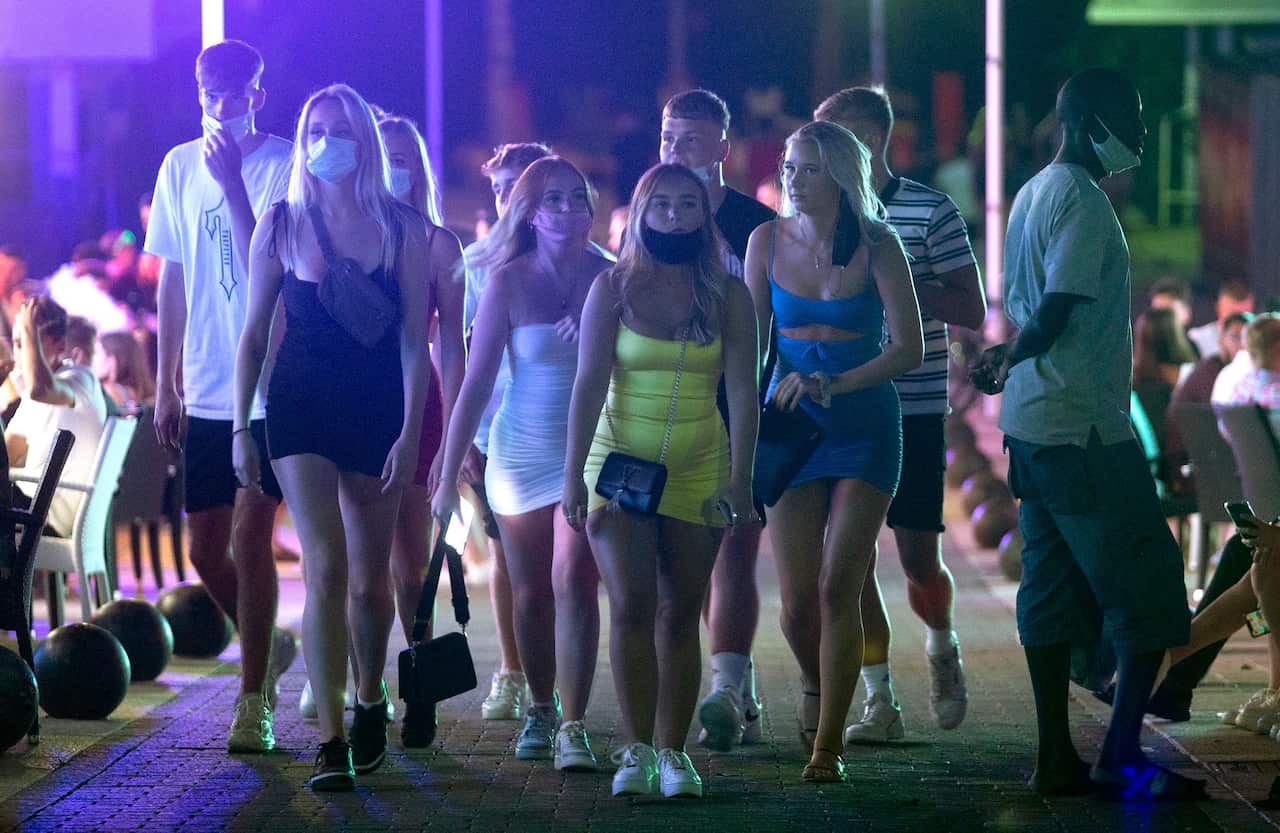 Young tourists at the resort of Magaluf on the Spanish Balearic island of Mallorca, Spain.