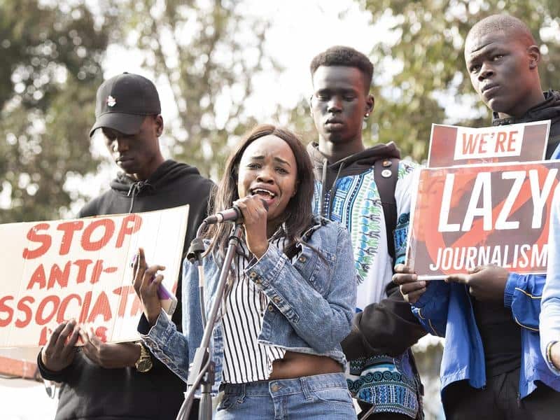 Speaker Nyawech Fouch addresses the crowd in Melbourne.
