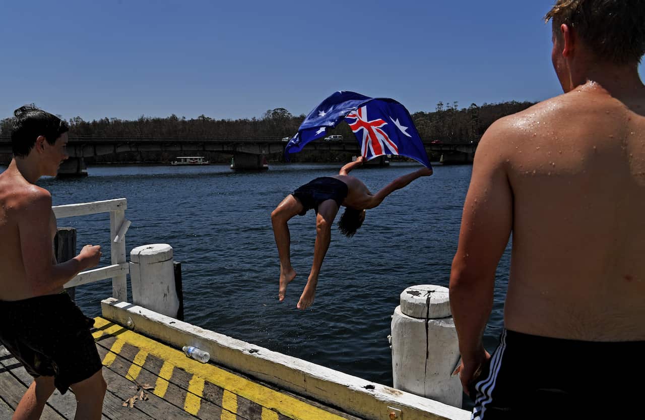 Local residents cool off in Clyde River near Batemans Bay.