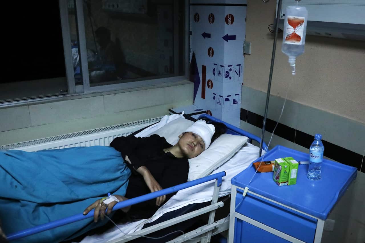An injured student receives medical treatments at a hospital after the bomb explosion near a school west of Kabul, Afghanistan, 8 May 2021.