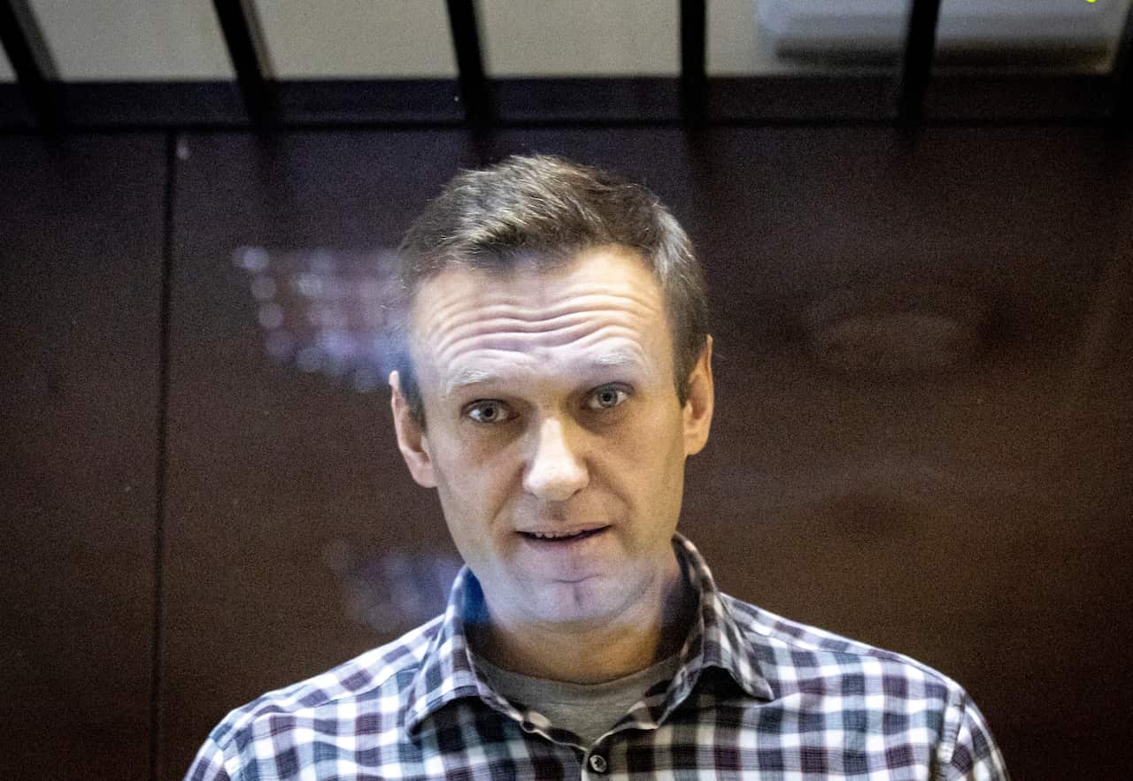 Alexei Navalny behind the glass of the cage in the Babuskinsky District Court in Moscow, Feb. 20, 2021.