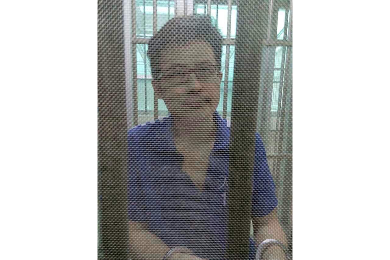 In this December 2014 file photo, Yang Maodon sits in a detention centre in Guangzhou in southern China's Guangdong province. 