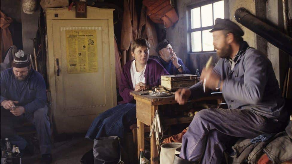 A 36-year-old Angela Merkel in a fishermen's hut on the northern German island of Ruegen.