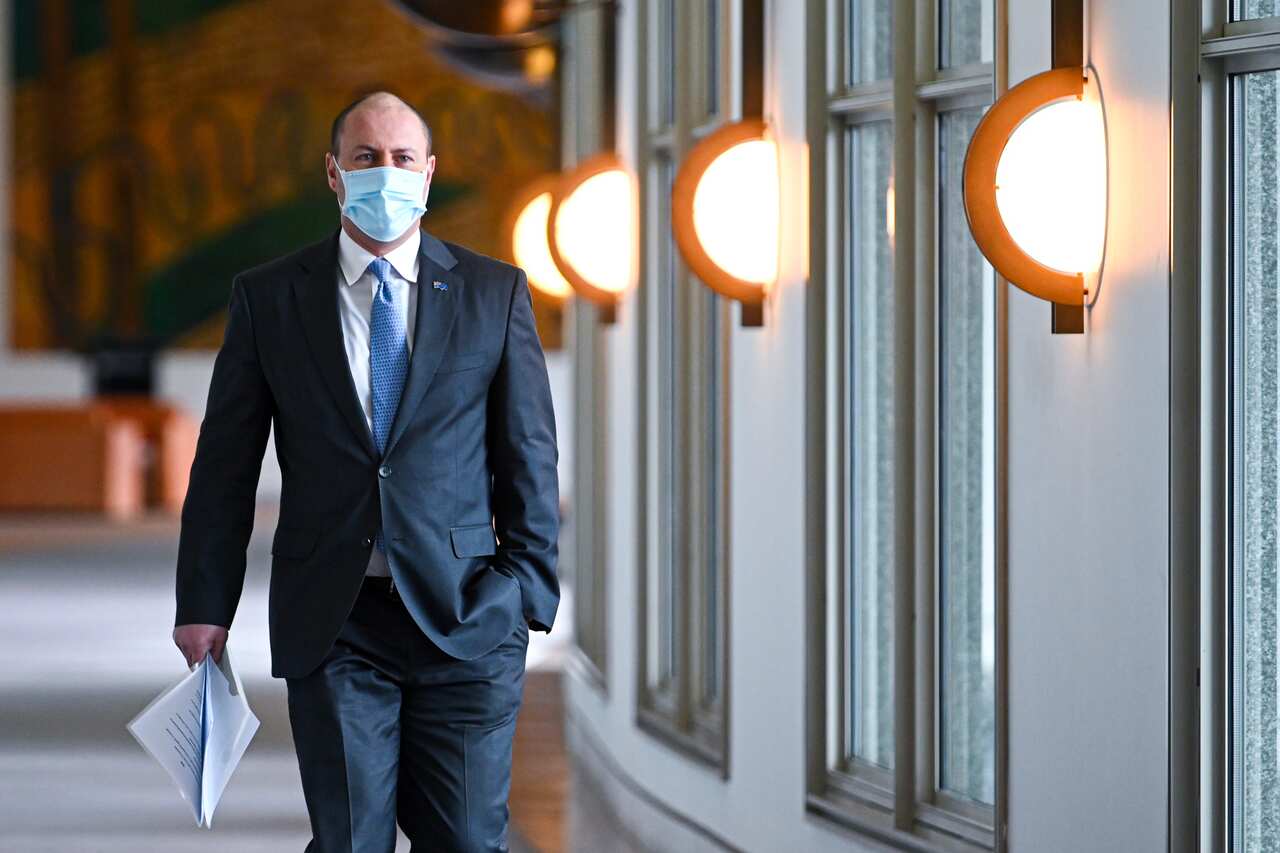 Australian Treasurer Josh Frydenberg arrives to deliver a fiscal strategy speech at Parliament House in Canberra.
