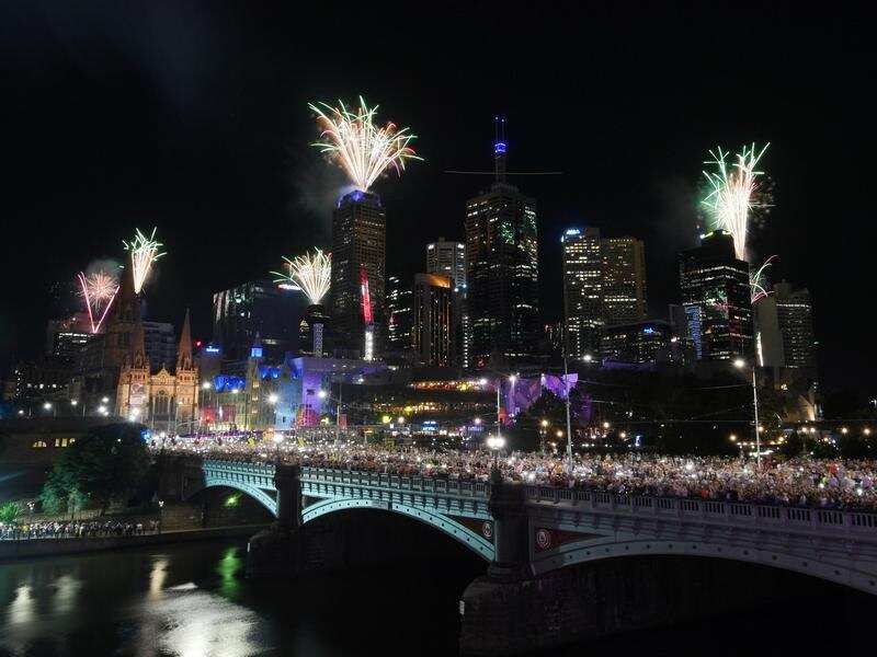 Fireworks explode over the Princes Bridge